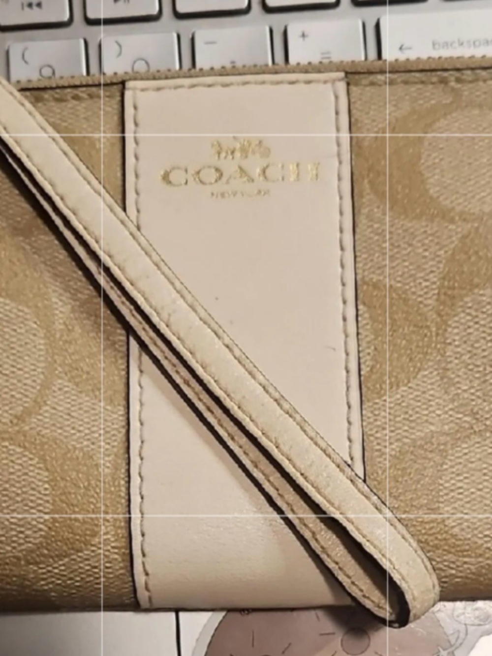 “Like-New” Coach Beige And Cream Signature Wristlet With Gold Logo EUC.